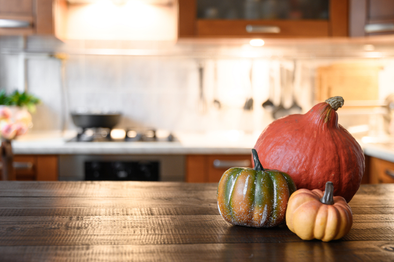 Cozy kitchen with pumpkins for Thanksgiving day or Halloween cooking